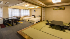 Tatami room with twin beds and low table