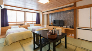 Tatami room with two beds and a low table
