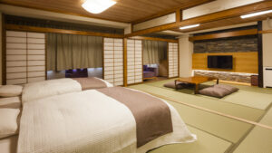 Twin beds beside a tatami seating area