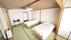 Two beds in a tatami guest room