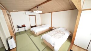 Two beds in a tatami guest room