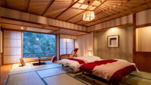 Tatami room with twin beds and window seating area