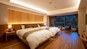 Two beds in a guest room with window seating