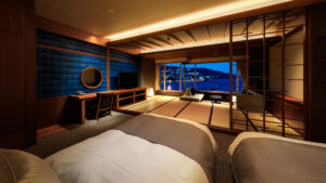 Lits jumeaux dans une chambre d’hôtes en tatami