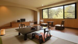 Tatami room with low table and chairs by window