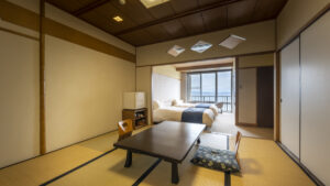 Japanese-style room with low table and twin beds