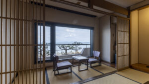 Tatami room with chairs and table by window