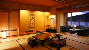 Tatami room with low table and chairs by window