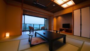Tatami room with low table and balcony chairs