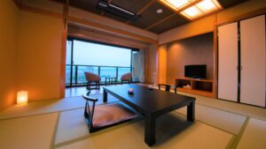 Tatami room with low table and chairs by window