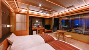 Twin beds in a Japanese-style guest room