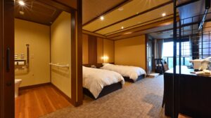 Twin beds in a Japanese-style guest room
