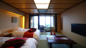 Letti singoli in camera tatami con tavolino basso