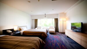 Twin beds in a bright guest room