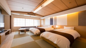 Twin beds in a tatami guest room