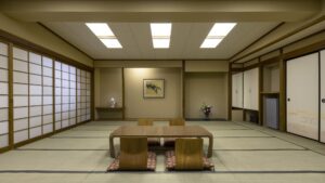 Camera in tatami con tavolo basso e sedie da pavimento