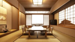 Camera in tatami con tavolo basso e sedute da pavimento