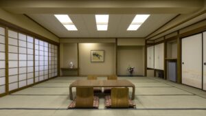 Camera in tatami con tavolo basso e sedie da pavimento