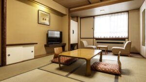 Camera in tatami con tavolo basso, cuscini da pavimento e sedie