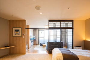 Bed in a modern Japanese-style guest room