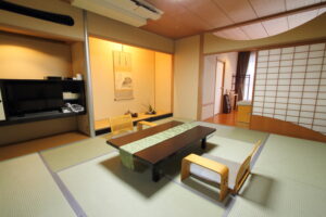 Tatami room with low table and floor chairs