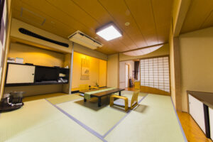 Tatami room with low table and floor chairs