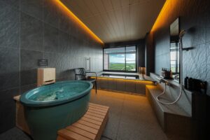 Private bath tub in a modern room with window