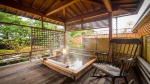 Private open-air wooden bath on a covered terrace