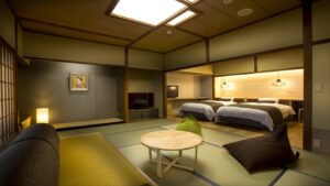 Tatami guest room with twin beds and low table
