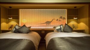 Two twin beds with decorative headboard art