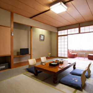 Tatami room with low table and floor chairs