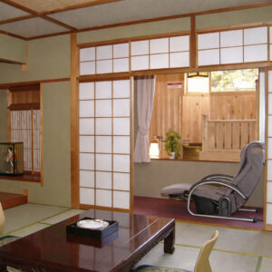 Tatami room with low table and massage chair