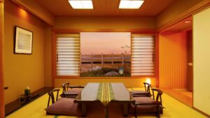 Habitación de tatami con mesa baja y cojines de suelo