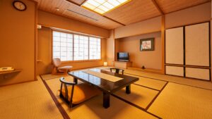 Habitación de tatami con mesa baja y asientos en el suelo