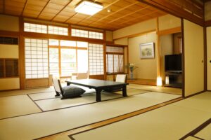 Tatami room with low table and floor chairs