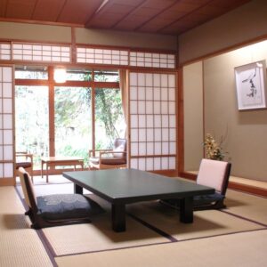 Tatami room with low table and floor chairs