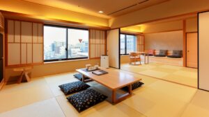 低いテーブルと座布団のある畳の部屋