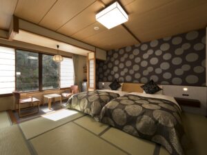 Twin beds in a tatami guest room