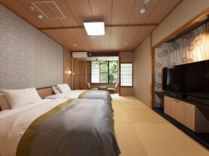 Twin beds in a tatami guest room