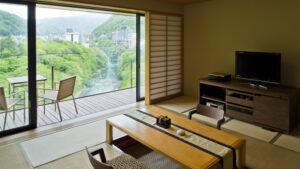 River view from tatami room with balcony chairs