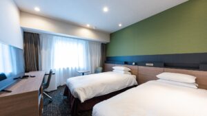 Twin beds in a modern guest room