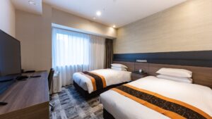 Twin beds in a modern guest room