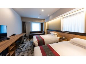 Twin beds in a modern guest room