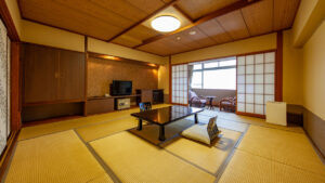 Tatami room with low table and chairs