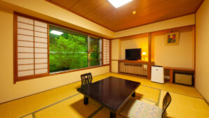 Tatami room with low table and floor chairs