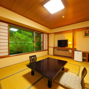 Tatami room with low table and floor chairs