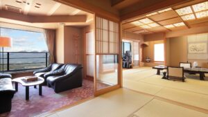 Tatami room with low table and sofa seating area
