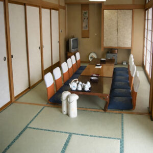 Tatami room with low table and floor chairs