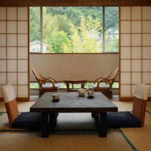 Tatami seating area with low table and window chairs