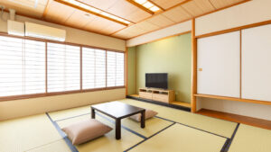 ローテーブルと座布団のある畳の部屋